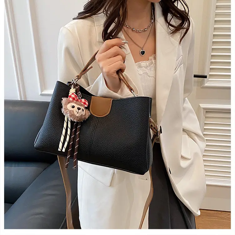 2025 Women's White Leather Shoulder Crossbody Bag with Cute Charm — feature 9