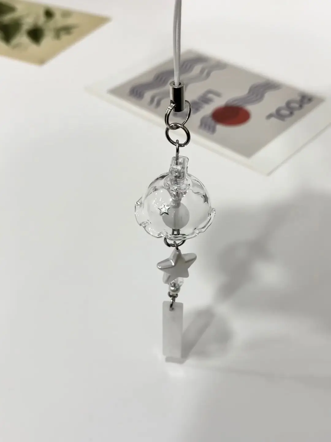 Ins Five-Pointed Star Wind Chime Mobile Phone Case Pendant — feature 1