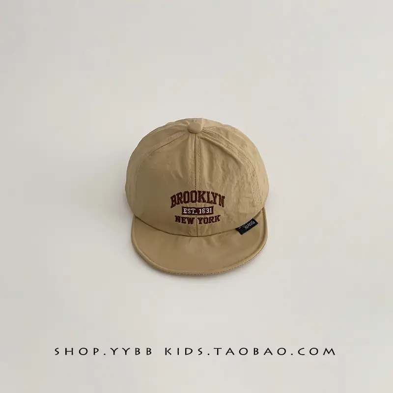 Green Brooklyn-themed Baby Cap Small - Image 3