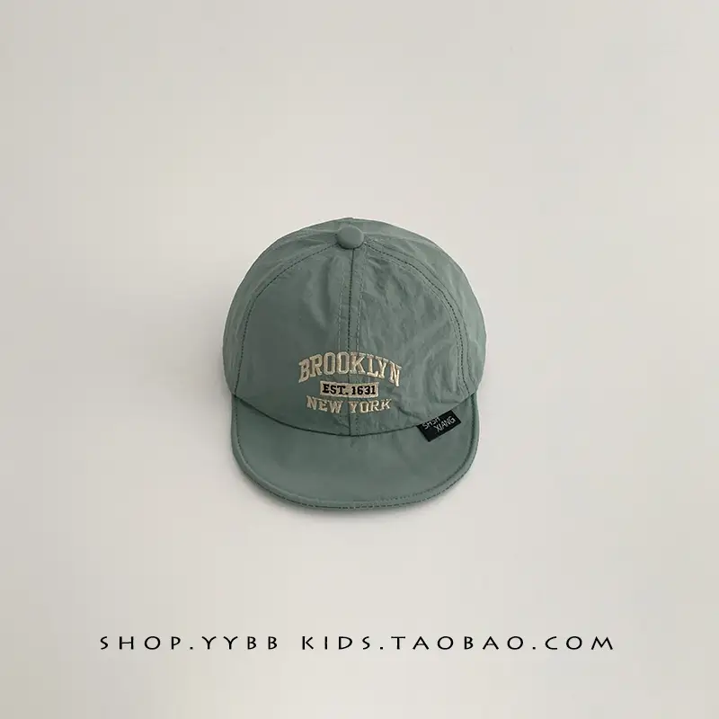 Green Brooklyn-themed Baby Cap Small - Image 5