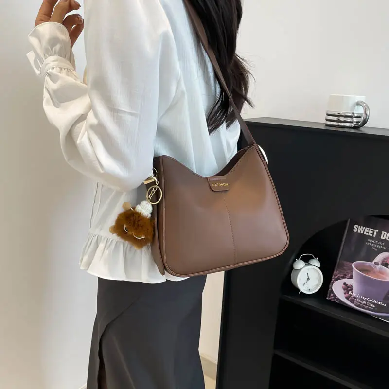 White Beanbag Shoulder Bag with Cute Pom Pom Charm - Image 7
