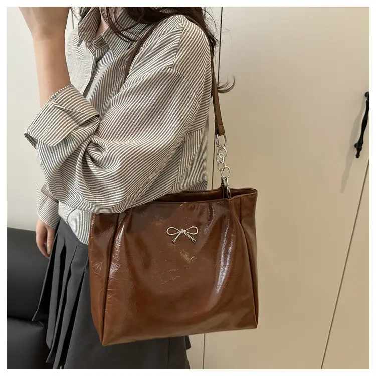 2025 Women's Brown Leather Shoulder Tote Bag with Chain Detail — feature 12
