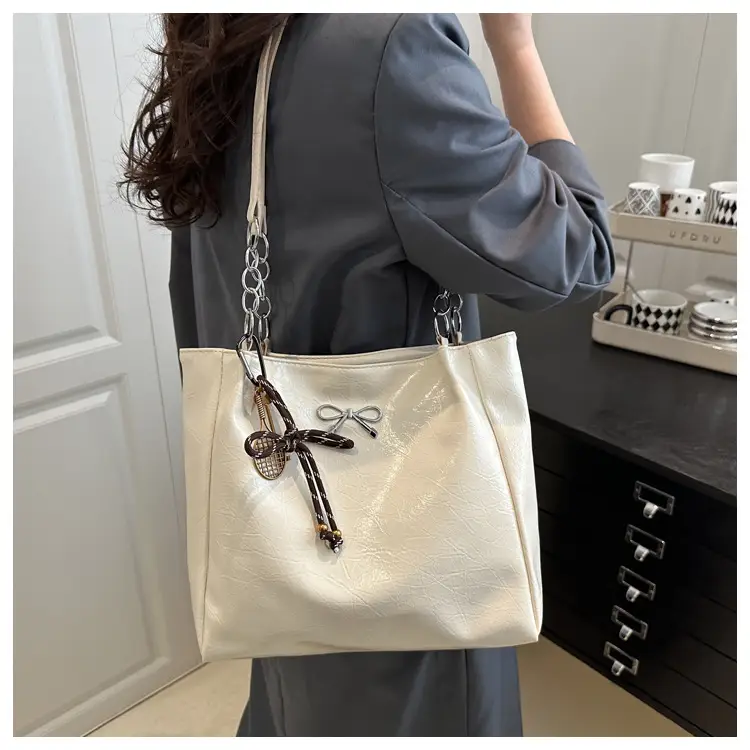 2025 Women's Brown Leather Shoulder Tote Bag with Chain Detail — feature 9
