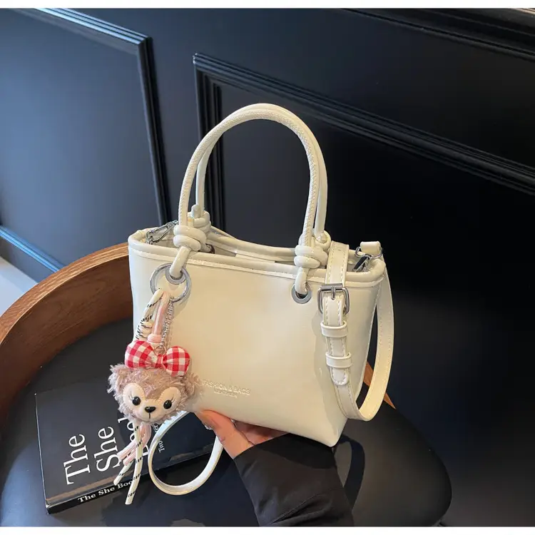 Women's Light Blue Leather Bucket Bag with Handle & Charm — feature 10