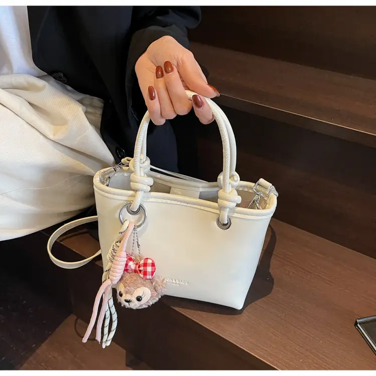 Women's Light Blue Leather Bucket Bag with Handle & Charm — feature 11
