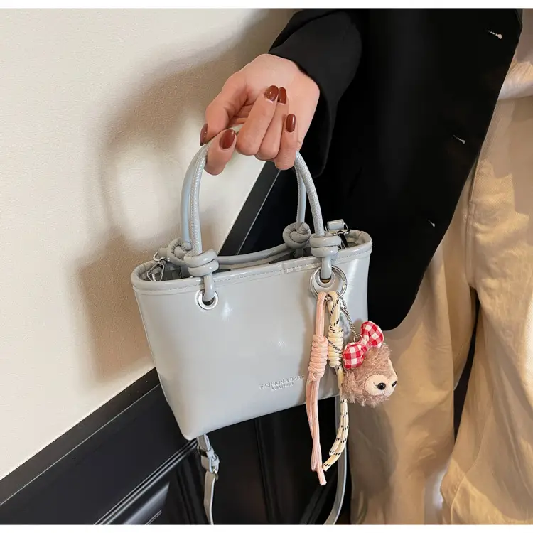 Women's Light Blue Leather Bucket Bag with Handle & Charm — feature 13