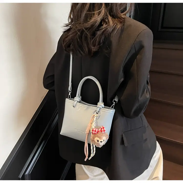 Women's Light Blue Leather Bucket Bag with Handle & Charm — feature 14
