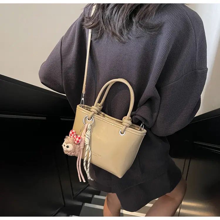 Women's Light Blue Leather Bucket Bag with Handle & Charm — feature 17