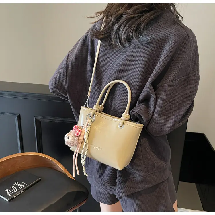 Women's Light Blue Leather Bucket Bag with Handle & Charm — feature 18