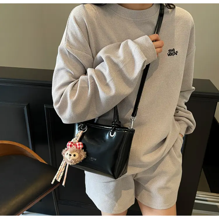 Women's Light Blue Leather Bucket Bag with Handle & Charm — feature 21