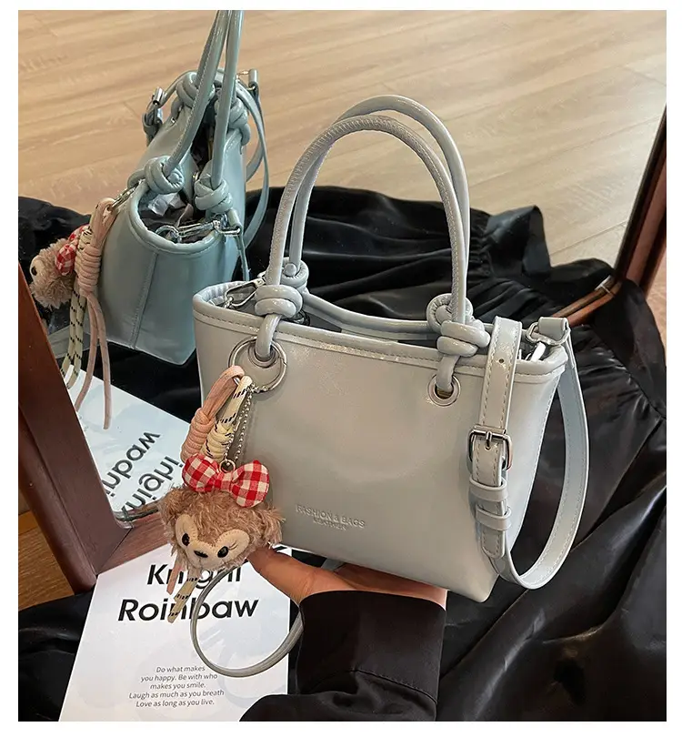 Women's Light Blue Leather Bucket Bag with Handle & Charm — feature 3