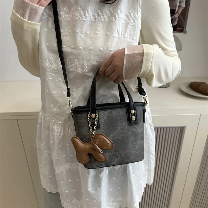 Women's Blue Denim Shoulder Bag with Brown Leather Handle & Crossbody Strap