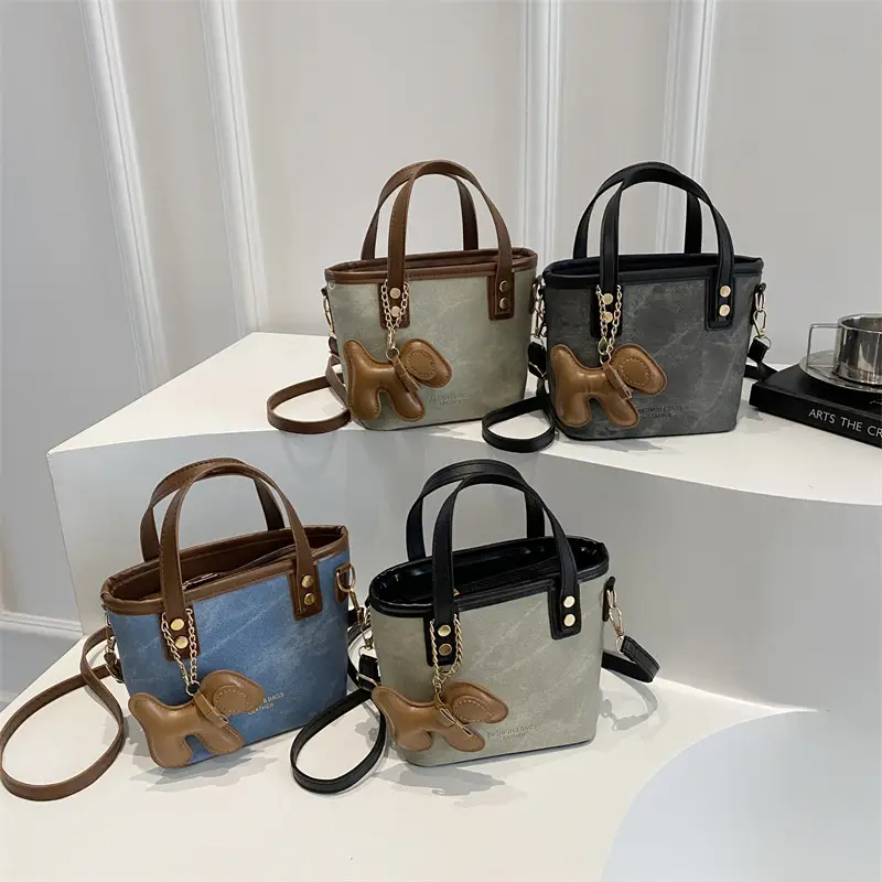 Women's Blue Denim Shoulder Bag with Brown Leather Handle & Crossbody Strap