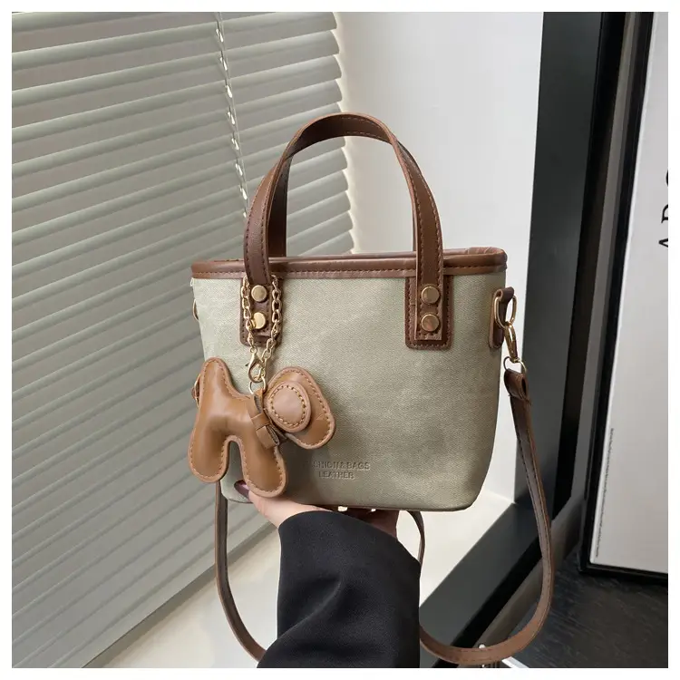 Women's Blue Denim Shoulder Bag with Brown Leather Handle & Crossbody Strap — feature 10