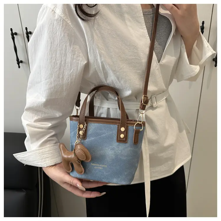 Women's Blue Denim Shoulder Bag with Brown Leather Handle & Crossbody Strap — feature 15