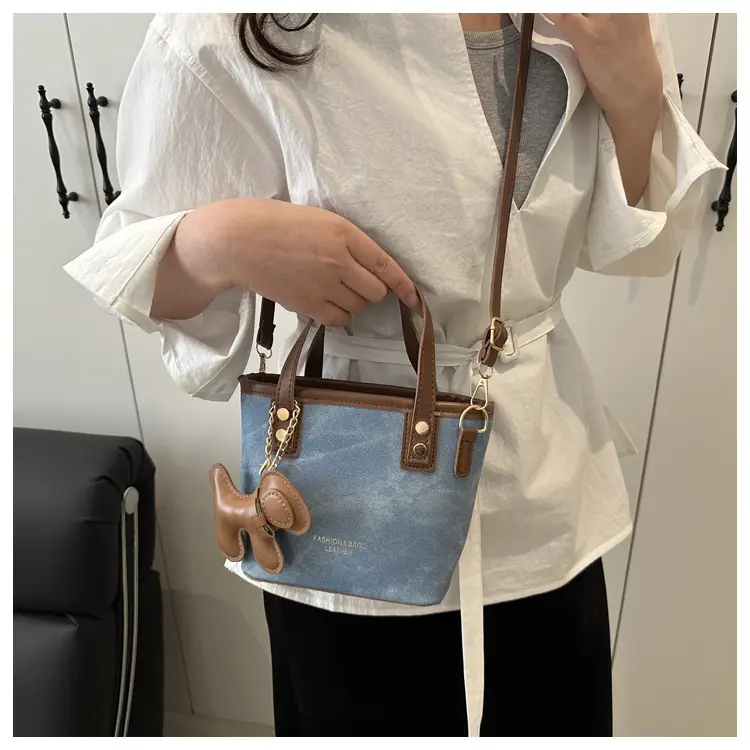 Women's Blue Denim Shoulder Bag with Brown Leather Handle & Crossbody Strap — feature 16
