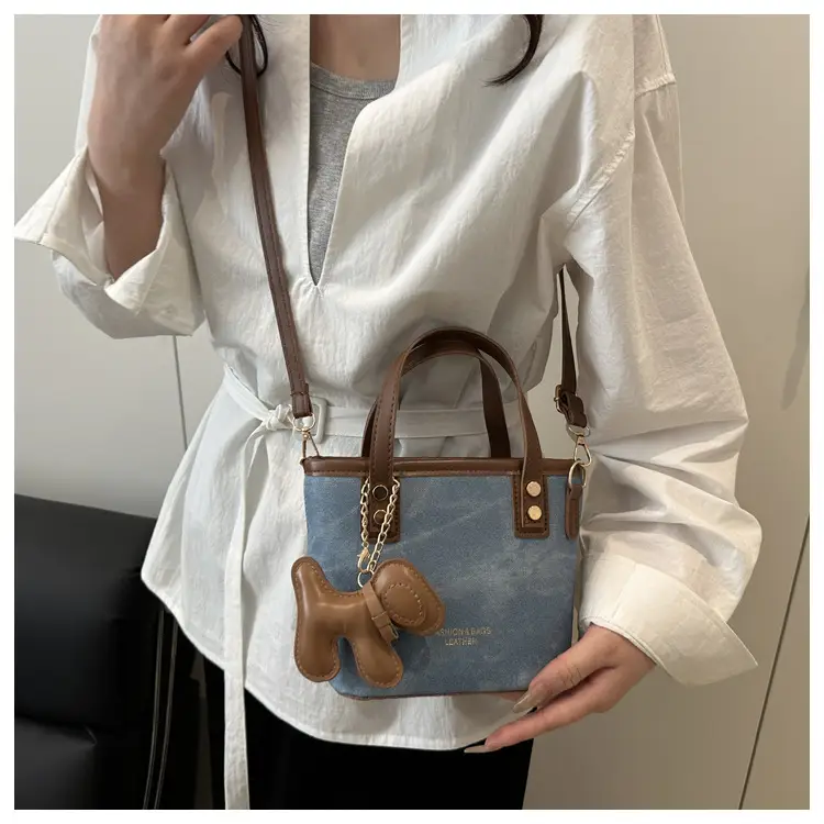 Women's Blue Denim Shoulder Bag with Brown Leather Handle & Crossbody Strap — feature 17