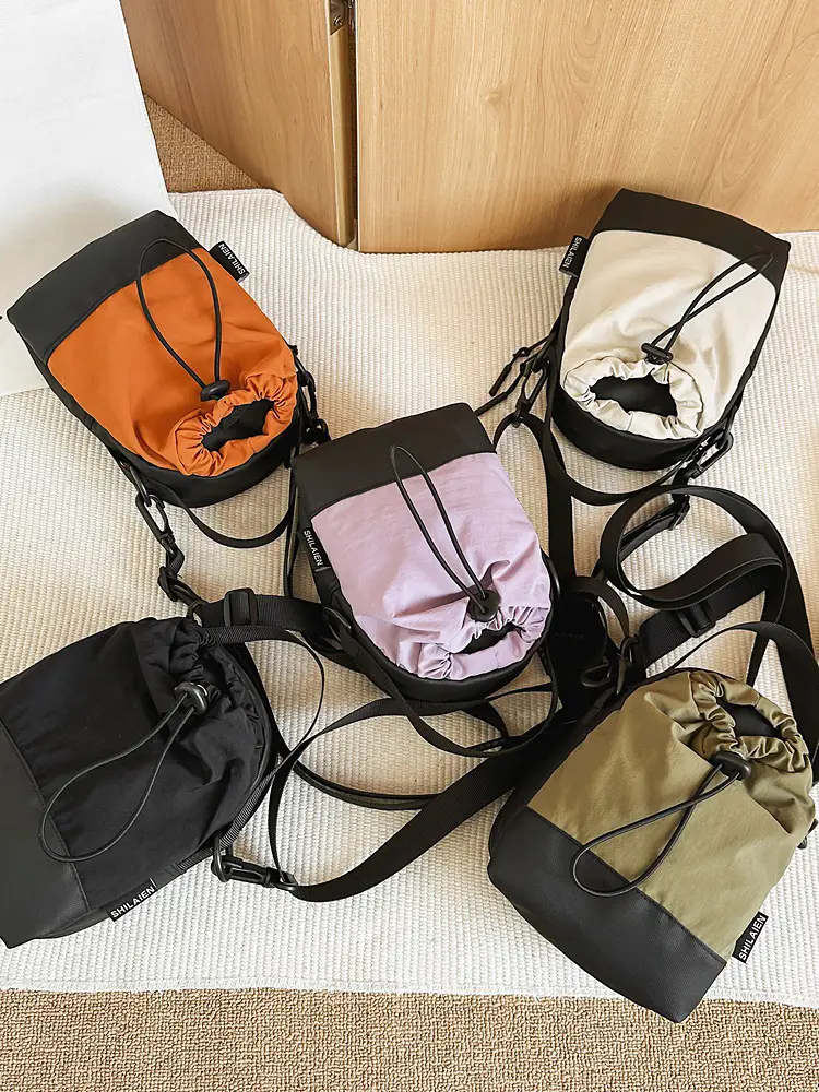Men Orange Drawstring Phone Bag with Crossbody Strap - Image 9