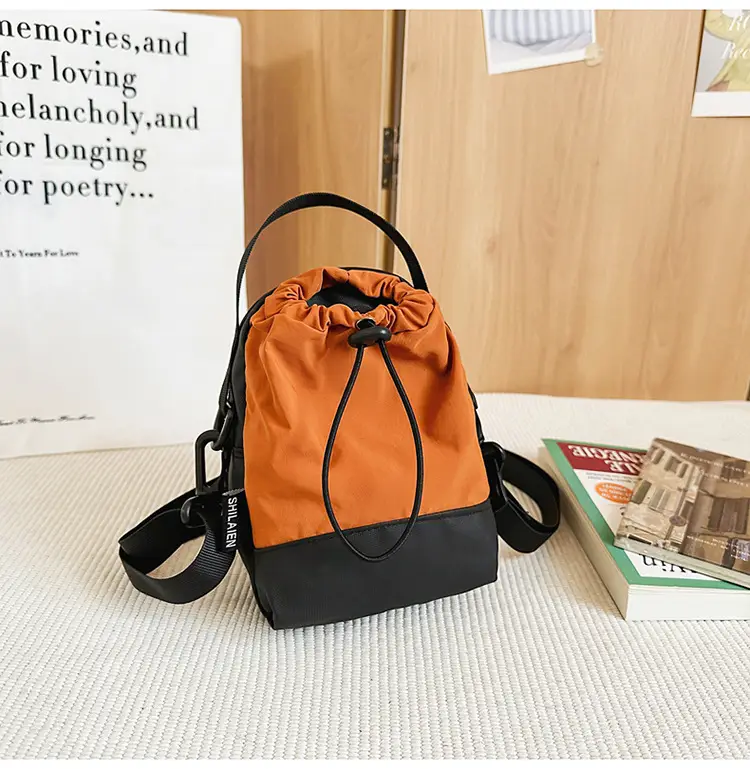 Men Orange Drawstring Phone Bag with Crossbody Strap — feature 37