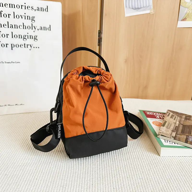 Men Orange Drawstring Phone Bag with Crossbody Strap - Image 2