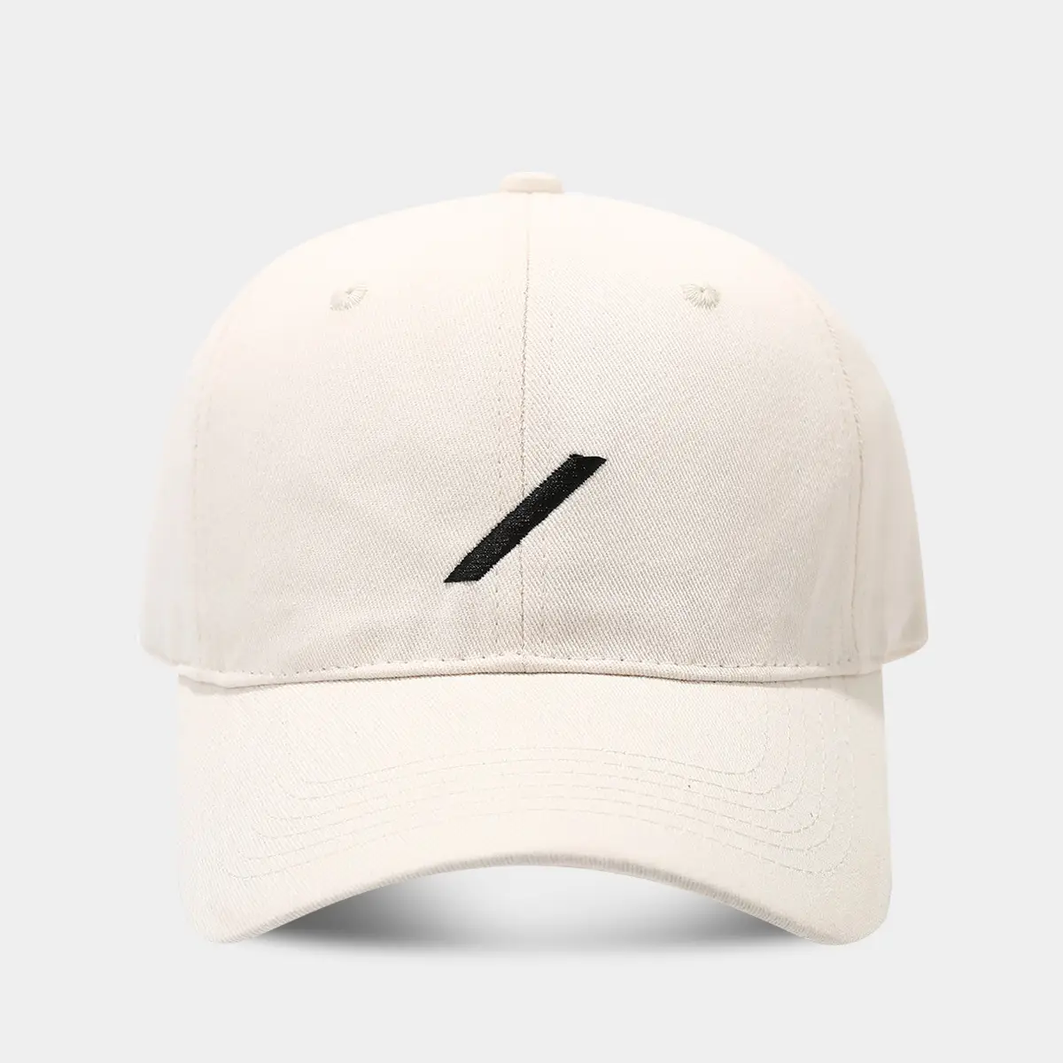 Black Baseball Cap with Embroidered Face Design - Image 2