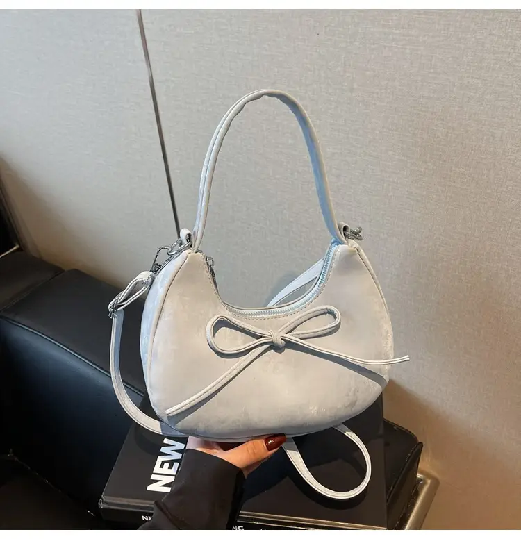 Black Matte Crossbody Bag with Dumpling Design — feature 13