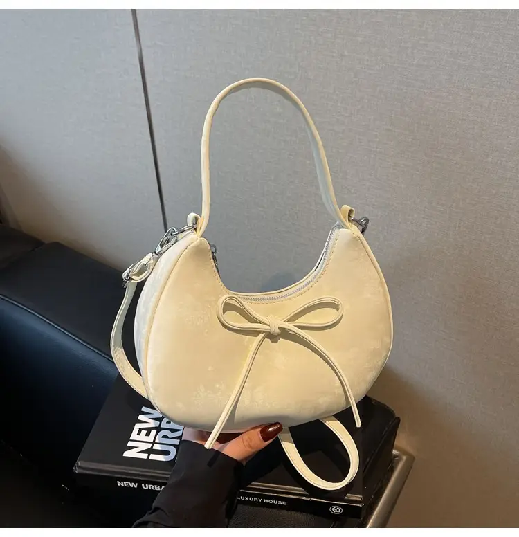 Black Matte Crossbody Bag with Dumpling Design — feature 15