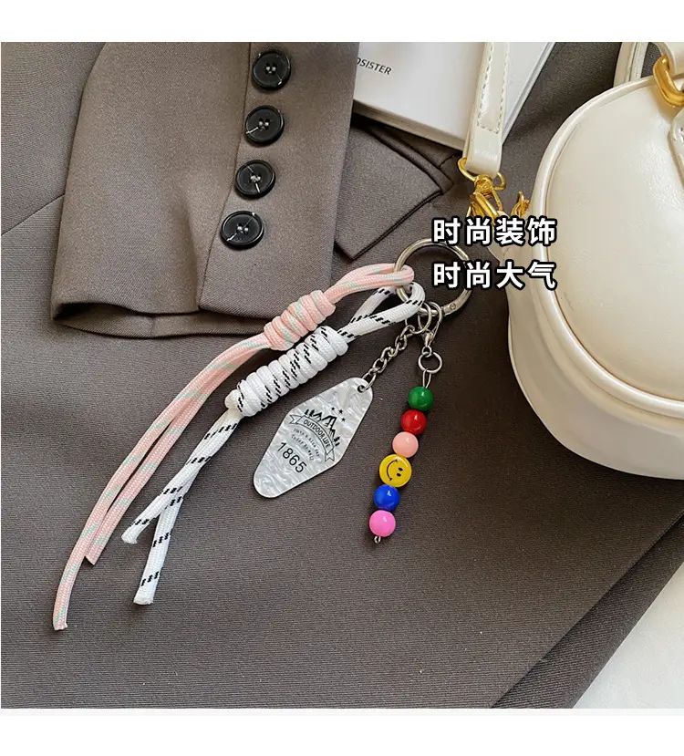 Women's Creamy White Bowtie Shoulder Bag with Tassel — feature 9