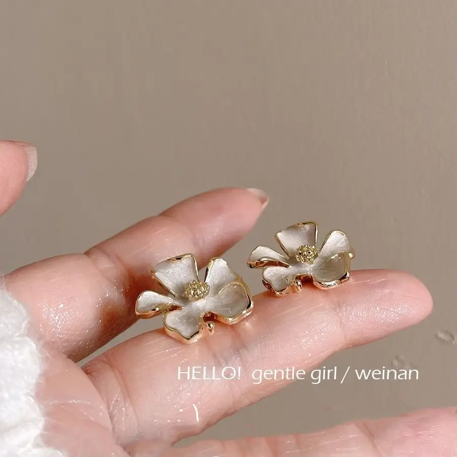 Milk White Floral Stud Earrings with Glaze Finish - Image 3