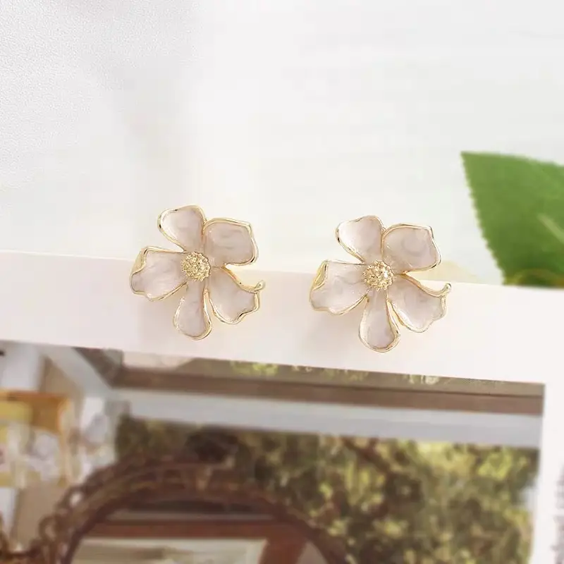 Milk White Floral Stud Earrings with Glaze Finish — feature 8