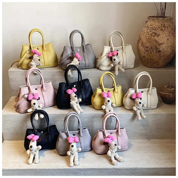 Women Cream Leather Large Tote Bag with Doll Charm — feature 1