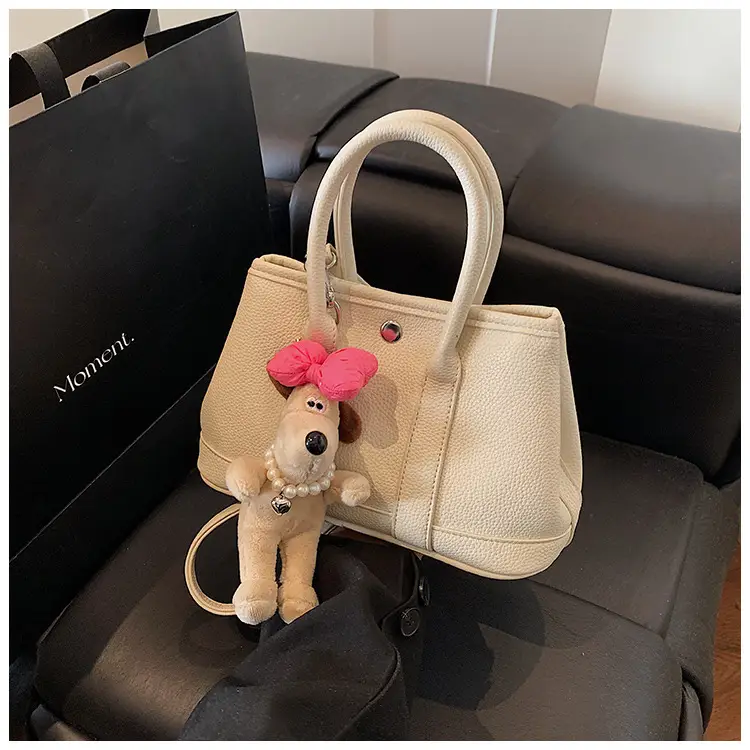 Women Cream Leather Large Tote Bag with Doll Charm — feature 23