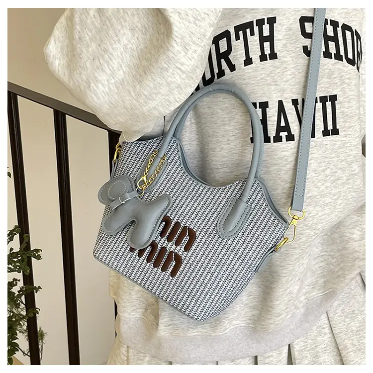 Women Air Mom Beige Canvas Shoulder Bag with Bone Design — feature 17