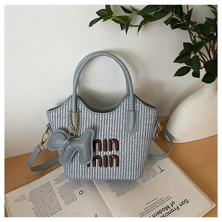 Women Air Mom Beige Canvas Shoulder Bag with Bone Design — feature 19