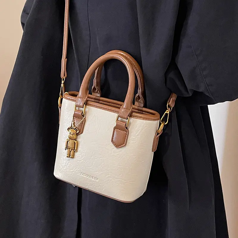 Women's Brown Crossbody Bag with Doll Pendant - Image 8