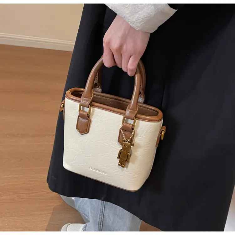 Women's Brown Crossbody Bag with Doll Pendant — feature 13