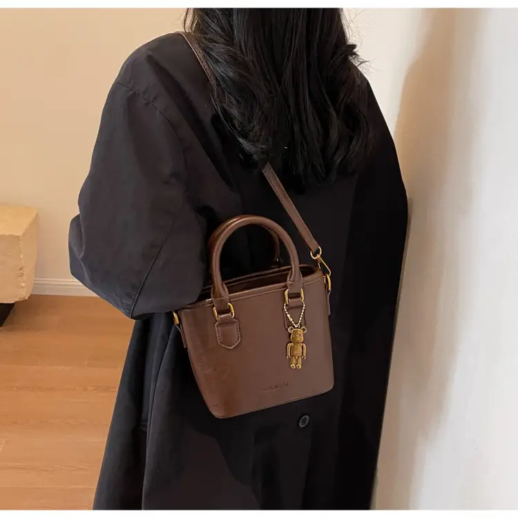 Women's Brown Crossbody Bag with Doll Pendant — feature 16