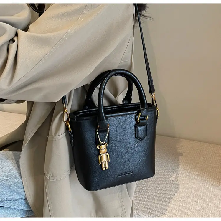 Women's Brown Crossbody Bag with Doll Pendant — feature 18