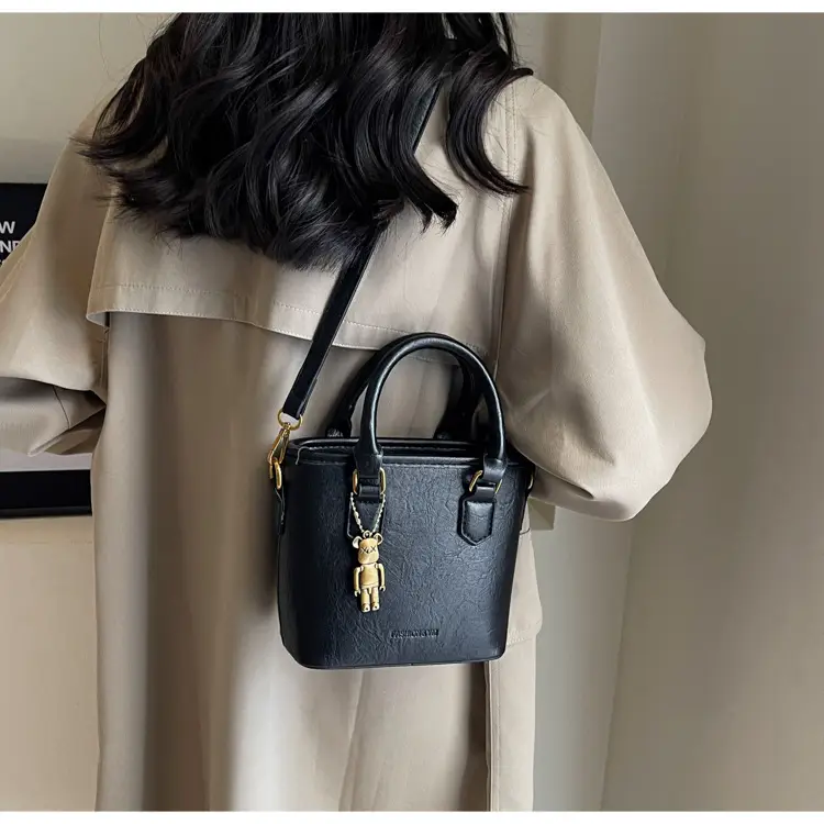 Women's Brown Crossbody Bag with Doll Pendant — feature 19