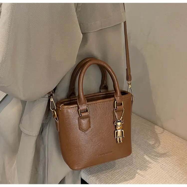Women's Brown Crossbody Bag with Doll Pendant — feature 21
