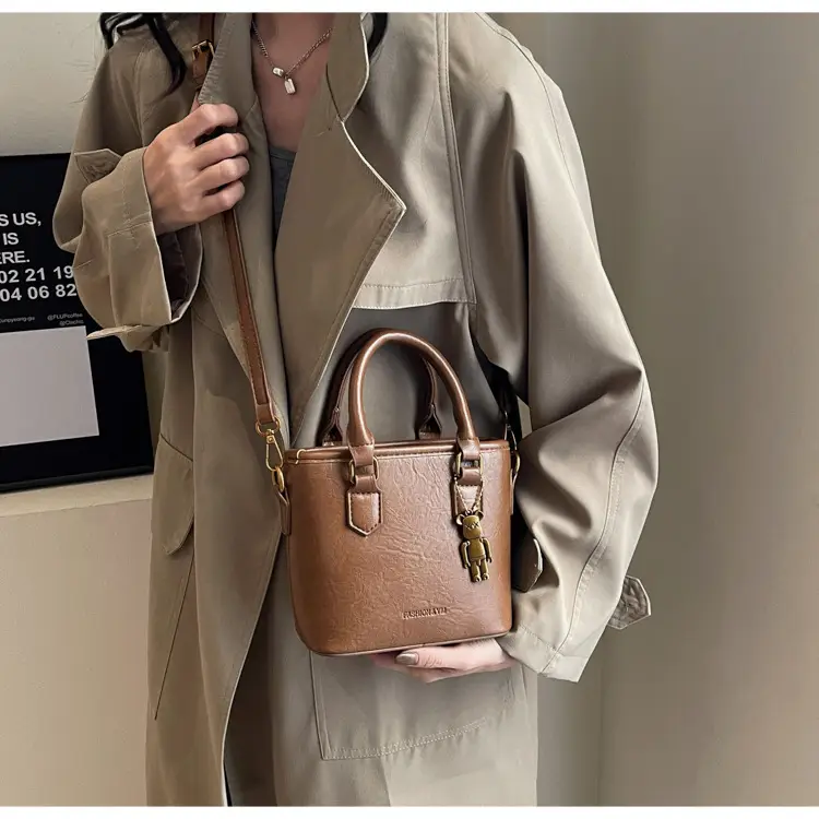 Women's Brown Crossbody Bag with Doll Pendant — feature 22