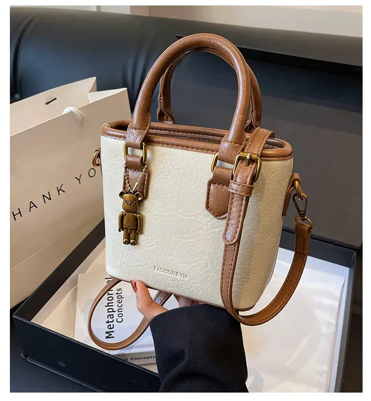 Women's Brown Crossbody Bag with Doll Pendant — feature 3