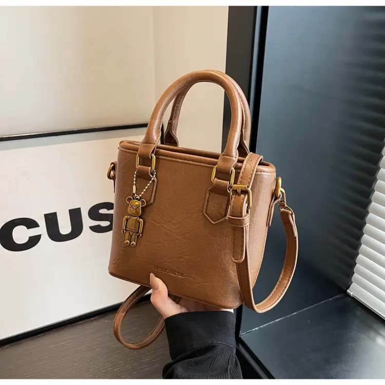 Women's Brown Crossbody Bag with Doll Pendant — feature 30