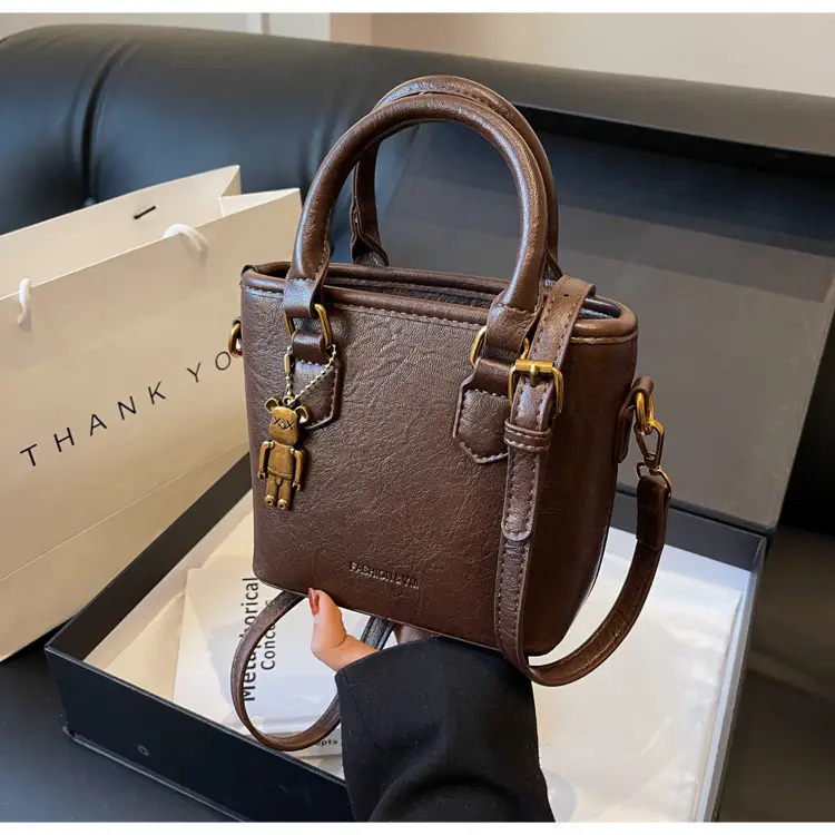Women's Brown Crossbody Bag with Doll Pendant — feature 33