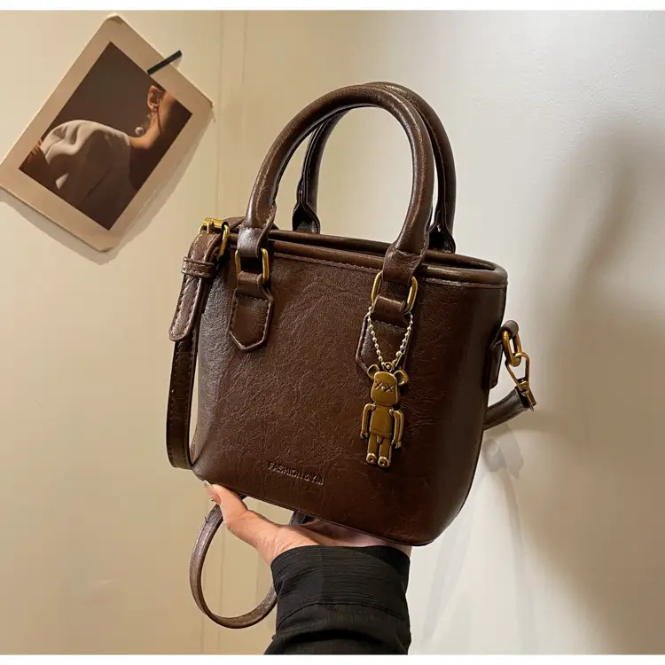 Women's Brown Crossbody Bag with Doll Pendant — feature 34