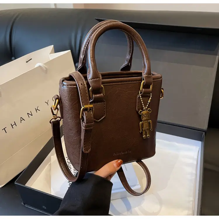 Women's Brown Crossbody Bag with Doll Pendant — feature 35