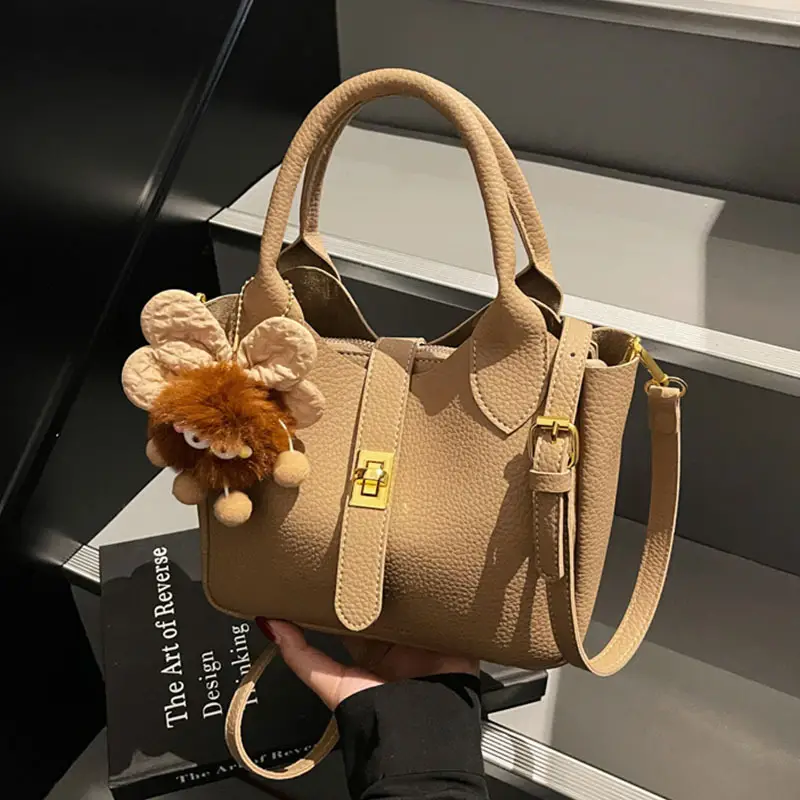 Women's White Leather Bucket Bag with Cute Pom Pom Charm - Image 9