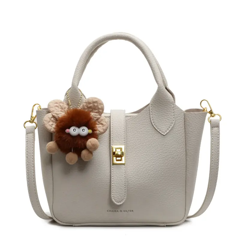Women's White Leather Bucket Bag with Cute Pom Pom Charm - Image 10