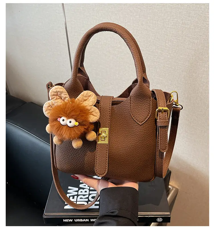 Women's White Leather Bucket Bag with Cute Pom Pom Charm — feature 1