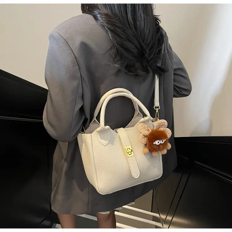 Women's White Leather Bucket Bag with Cute Pom Pom Charm — feature 11